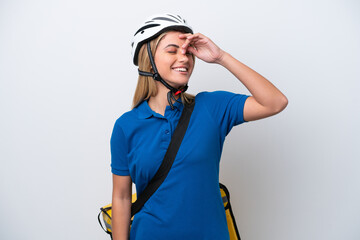 Young caucasian woman with thermal backpack isolated on white background has realized something and intending the solution