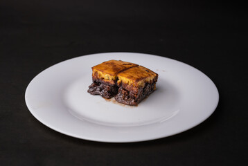 Sweet martabak terang bulan, chocolate peanut pancakes on a white plate