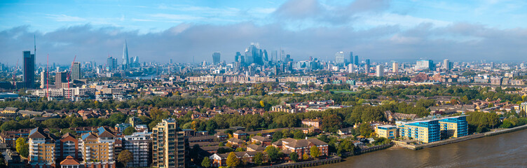 Naklejka premium Panoramic image of London Skyline and river Thames from Canary Wharf. 