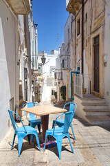 Street cafe in downtown of Ostuni, Italy