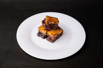 3 pieces of sweet martabak on a white plate, indonesian street food