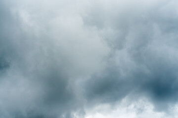 Dark dramatic storm cumulus clouds in autumn. An impending storm, hurricane or thunderstorm. Bad weather.