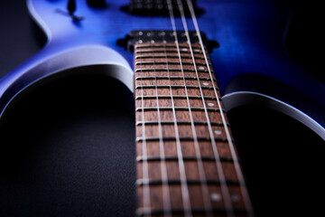 Fretboard of modern electric guitar. Close up.	