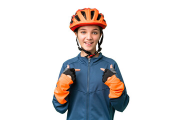 Teenager cyclist girl over isolated chroma key background with surprise facial expression