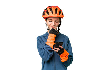 Teenager cyclist girl over isolated chroma key background thinking and sending a message