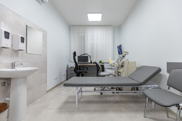 Modern Medical Examination Room with Essential Equipment