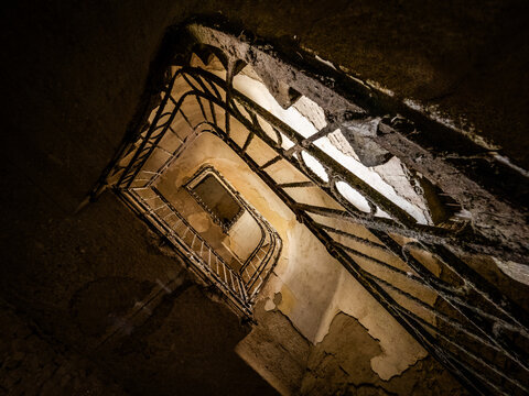 Old decaing spiral staircase in a hungarian castle