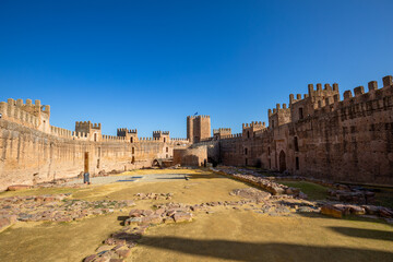 View of the interior of the medieval castle of Burgalimar in Baos de la Encina, Jan, Andalusia, Spain with morning light