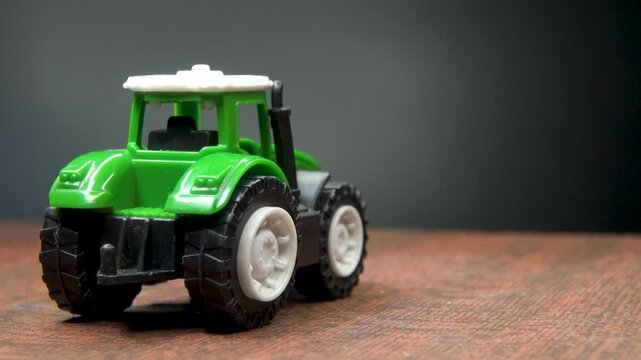 Small children's toy bulldozer car