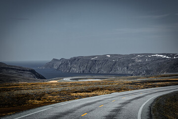 Norwegian fjord, with bright blue sky and the typical mountains of the North Cape 