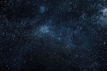 A dark blue night sky filled with many stars