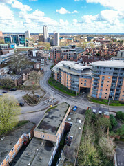 Obraz premium Aerial View of Downtown Buildings at Central Coventry City Centre of England United Kingdom. Drone's Camera Footage Was Captured During Bright Sunny Day From Medium High Altitude on March 30th, 2024