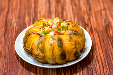 Traditional Brazilian recipe of shrimp in pumpkin, known as 