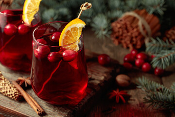 Christmas drink with spices, orange, and cranberries.
