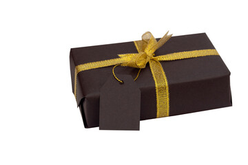 Black gift box with gold ribbon and tag isolated on white background. Black Friday concept