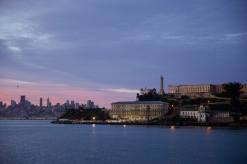 Alcatraz island prison back lit in the sunrise
