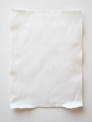 Obraz premium Empty white paper sheet on plain desk background with minimal flat lay design