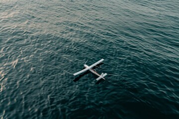 Solitary drone calmly sails over open ocean, embraced by serenity of the vast, rippling waters beneath the tranquil sky.