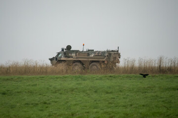 British army Patria Pasi Fuchs (Falcon Squadron) armoured 6x6 vehicle on a military exercise, Wiltshire UK