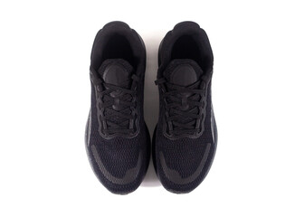 Unbranded black sports shoes photographed isolated on a white background
