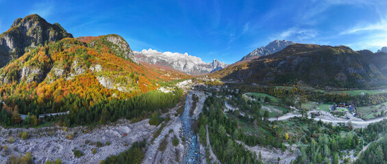 Albania Alps. Theth village in morning light, panoramic view