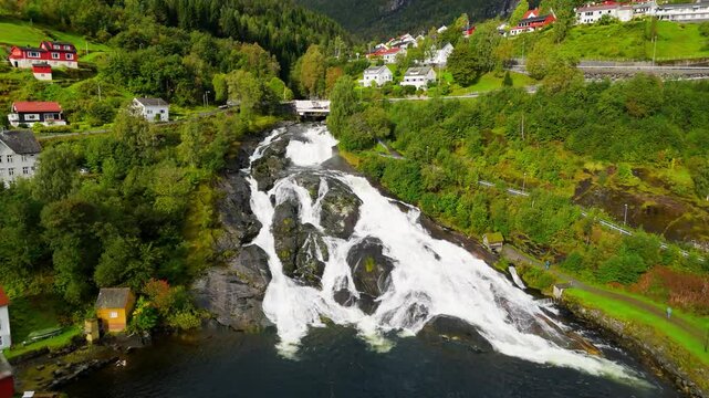 Hellesylt, Norway, a waterfall near the town, drone shot, aerial video