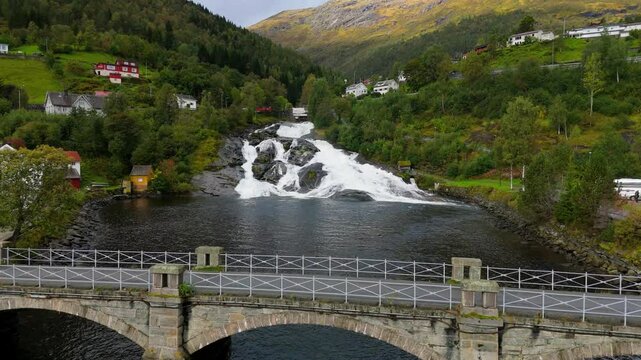 Hellesylt, Norway, a waterfall near the town, drone shot, aerial video