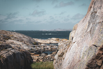 scissor islands off sm&ouml;gen in sweden, with bright sunshine and small white clouds