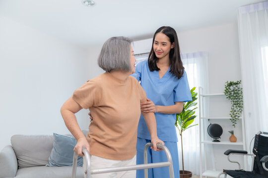 Skilled nurse aids senior woman with walker, ensuring stability and independence. Compassionate health care service enhancing elderly support, recovery, and quality of life.