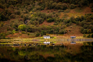 Fototapeta premium Autumn in Scotland with reflections in the lochs