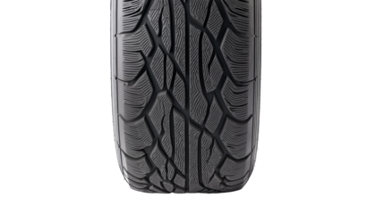 A close-up of a car tire showcases detailed tread patterns, emphasizing its design and wear for optimal performance.