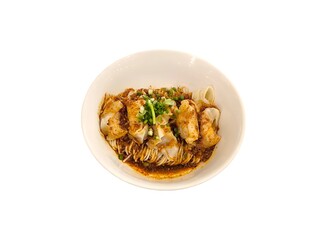 Shrimp and pork wontons with egg noodles in spicy sauce isolated on white background. Chinese food menu