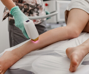 Master Of Laser Hair Removal Performs Procedure In Close-Up