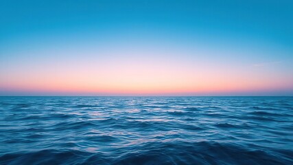 A serene and captivating ocean wallpaper featuring gentle waves and a clear blue sky, nature, blue, sky