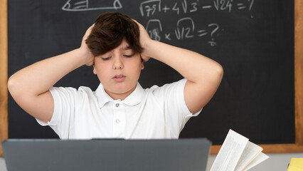 student using laptop pc at classroom