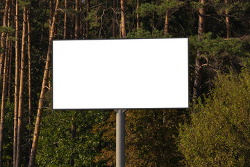 Background for design, white billboards on city streets and along roads in the summer day