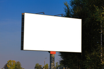 White billboard along the highway. Background for design and advertising. 