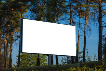 Background for design, white billboards on city streets and along roads in the summer day