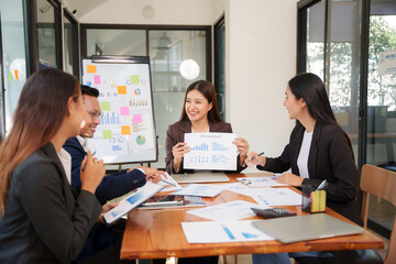 Group of Asian businessmen Sitting in meetings, talking, exchanging knowledge, presenting work.