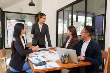 Group of Asian businessmen Sitting in meetings, talking, exchanging knowledge, presenting work.