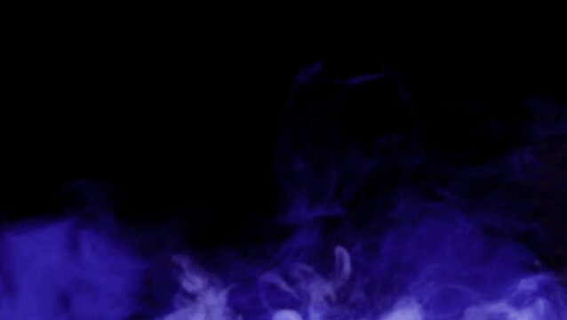 The blue smoke on black background