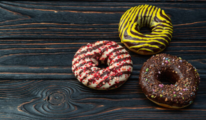 Sweet glazed colorful donuts . Top view