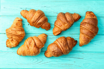 Group of sweet croissant . French morning breakfast . Top view
