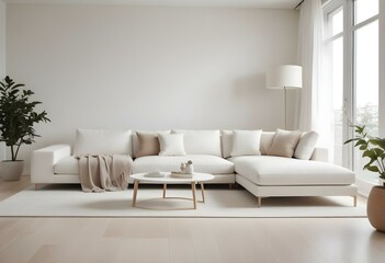 A modern living room with a large white sectional sofa, a white side table, and a beige area rug on a light hardwood floor.