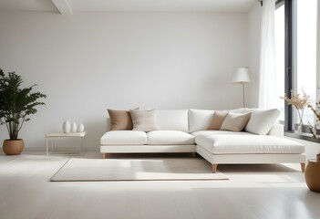 A modern living room with a large white sectional sofa, a white side table, and a beige area rug on a light hardwood floor.