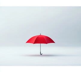 Bright red umbrella floating in the air