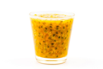 Passion fruit in a clear glass on a white background