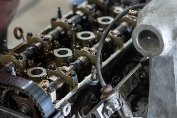 Auto parts repair in workshop close-up