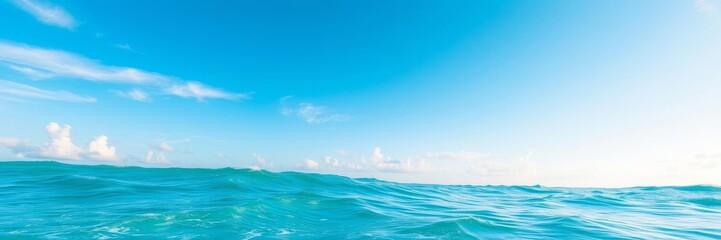 Fototapeta premium Beautiful ocean background with crystal clear blue water, gentle waves, and a clear sky, nature, waves