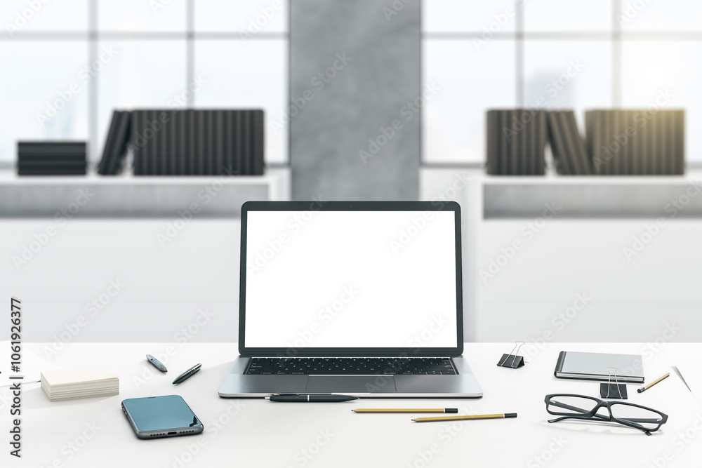 Aufkleber Front view on modern laptop with blank white screen with empty space on light table with smartphone, glasses and office tools on blurred shelves and window background. 3D rendering, mock up